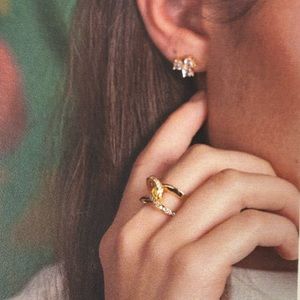 New with box Gold plated twist ring with cz